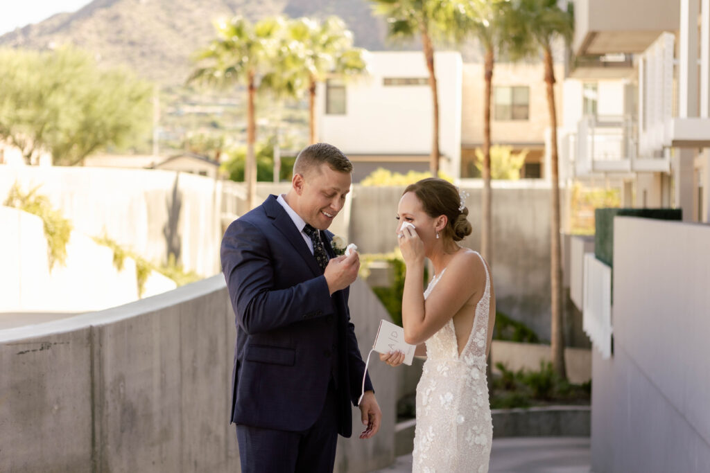 Bride and groom share emotions at their personal vows at Mountain Shadows Resort in Scottsdale, Arizona