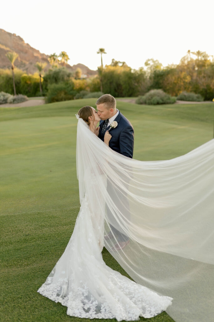 Arizona cis-het wedding at Mountain Shadows Resort with cathedral veil