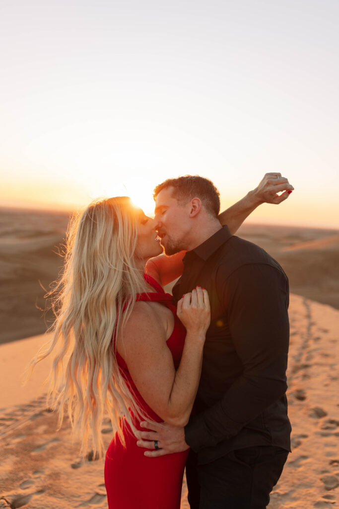 Couple kissing in Arizona and California Sand Dunes