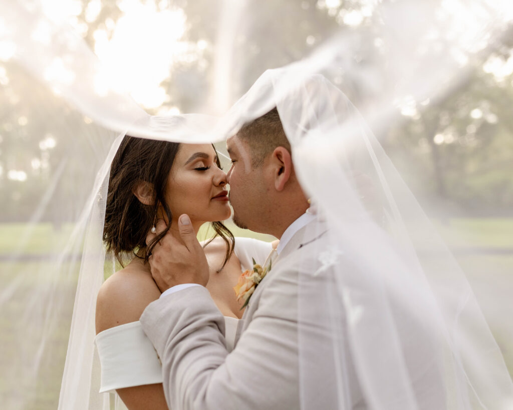 Veil kisses at Arizona wedding venue