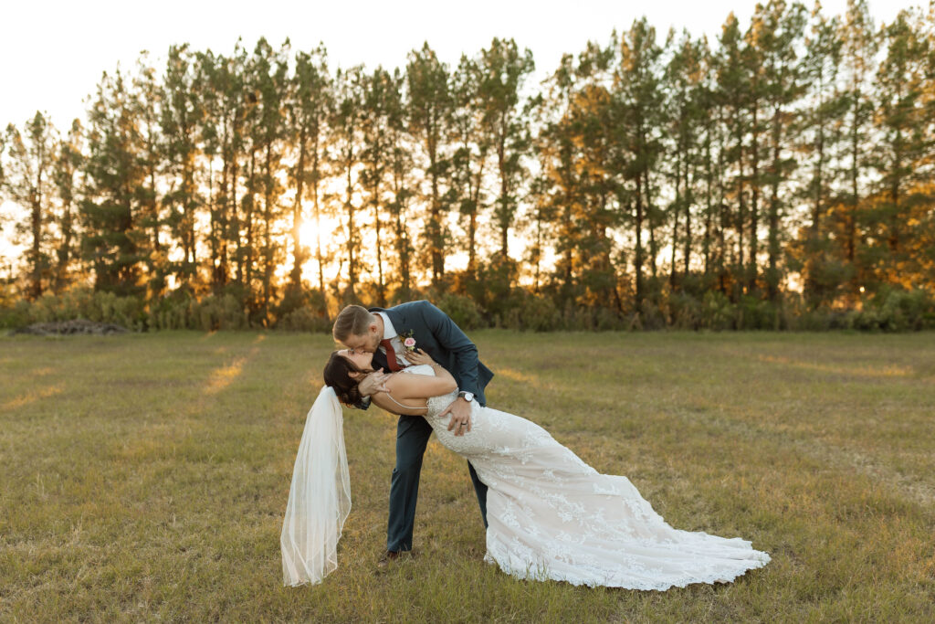 Bride and groom dipping and kissing at Arizona wedding venue