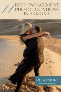 Couple kissing in the sand dunes in elegant black clothing